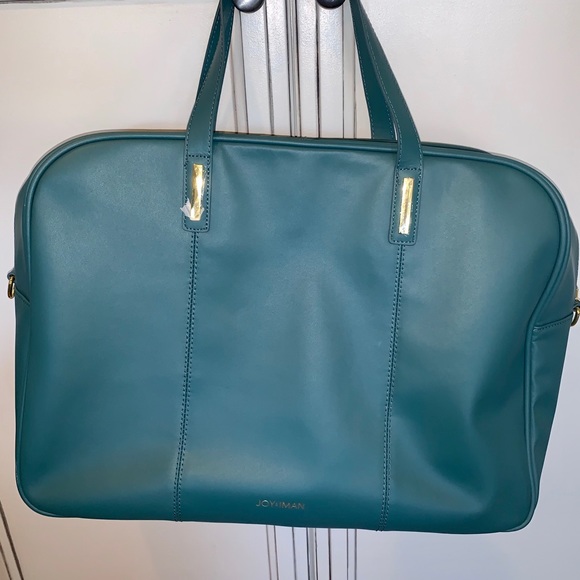 joy and iman duffle bag